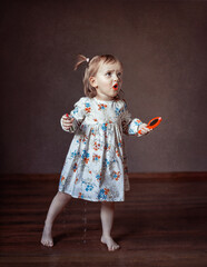 little girl put on lipstick and peed