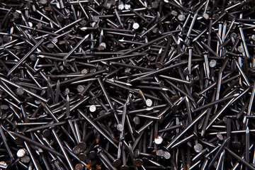 Piles of iron nails used in carpentry