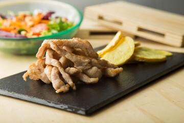 Chicken fingers are a style of fried chicken that includes only chicken, without bones or skin