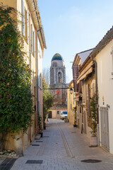 Saint Tropez tower narrow street with plants