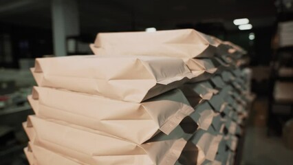 Woman using machine specially designed to dispense and package coffee to offer high quality of product and conserve it incredible tasty aroma 4k