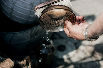 washing a glass bowl