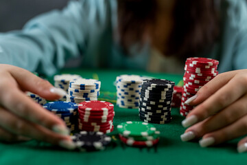 Naklejka premium girl in a casino plays poker with the confidence of winning the game. poker. woman with cards