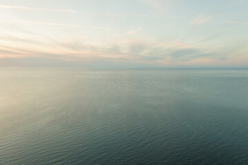 Top view of Narva Bay on a summer evening. Seascape. The sky is a pastel color. Space for text. Natural background.