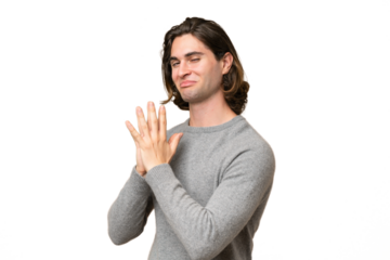 Young caucasian man isolated on green chroma background scheming something