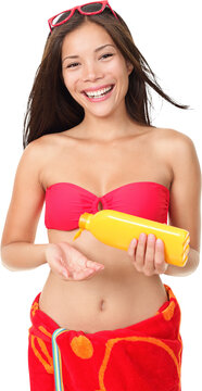 Sunscreen summer vacation woman isolated in transparent PNG holding suntan lotion wearing bikini and red towel. Mixed race Asian Chinese / Caucasian female model smiling happy holding cream bottle.