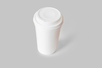 Empty blank white disposable coffee cup mockup isolated on a background. 3d rendering.