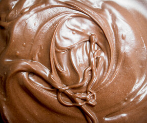 Chocolate paste in bowl .