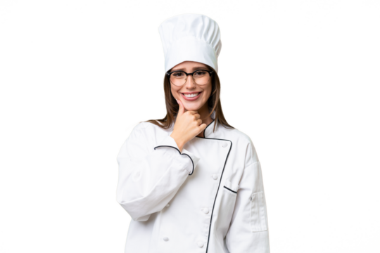 Young chef caucasian woman over isolated background with glasses and smiling
