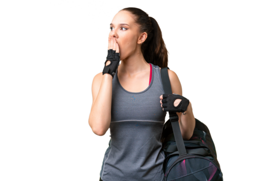 Young sport woman with sport bag over isolated background yawning and covering wide open mouth with hand