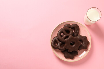 Concept of tasty bakery, gingerbread cookies in chocolate, space for text