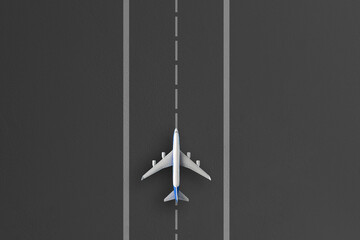 overhead view of the airplane on a take off line in airport