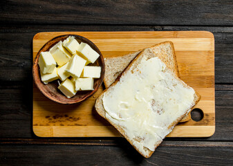 Toasted bread and butter on the Board.