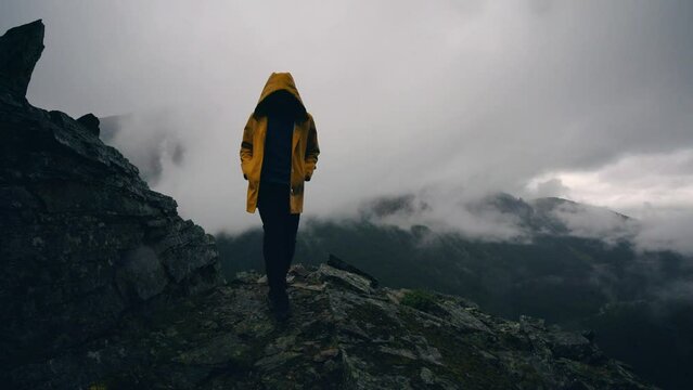 Man Hiking In The Rain