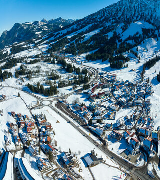 Germany, Bavaria, Oberjoch, Snow-covered village in Allgau Alps