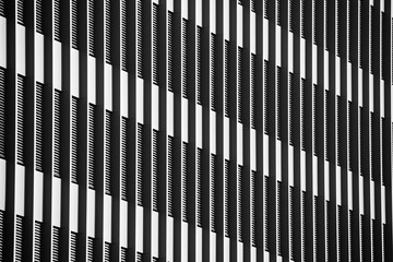 grayscale shot of a facade of a building