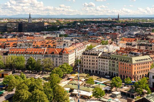 Germany, Munich,Victuals Market with apartment buildings in background