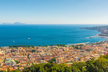 Aerial view of Naples city on the coast of Mediterranean sea, Campania, Italy. Cityscape of Napoli