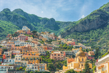 Fototapeta na wymiar View of Positano town with colorful buildings and church of Our Lady of the Assumption on Amalfi coast, Campania, Italy