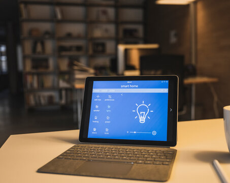 Tablet computer with smart home dashboard on screen