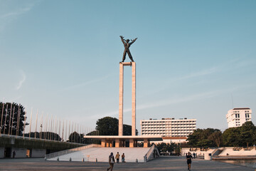 Landscape view of Monumen Pembebasan Irian Barat (West Irian Liberation Monument) during sunset.