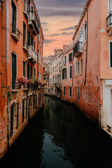Fototapeta na wymiar Venice's characteristic canal at dawn, without people and boats