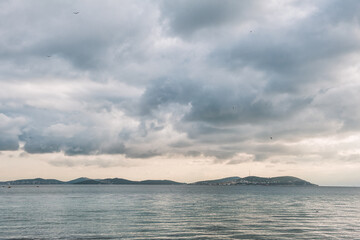 Beautiful landscape with dramatic sky, sea and islands