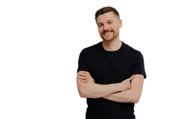 Horizontal shot of satisfied self assured man keeps arms folded smiles gladfully dressed casually enjoys day off poses against blue background with blank space. Handsome glad male model in studio