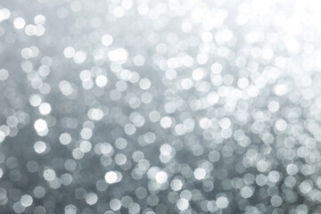 Fototapeta na wymiar Silver glittering background for design and free space.