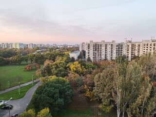 View of the park from the panel apartment at sunset