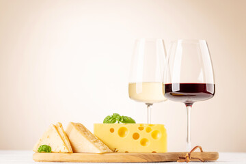 Various cheese on board and wine