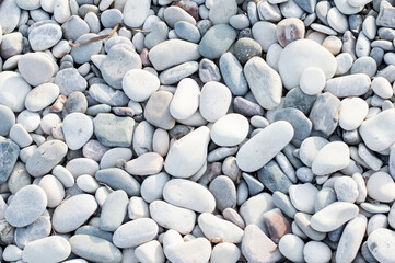 White stones on the beach, close up, texture