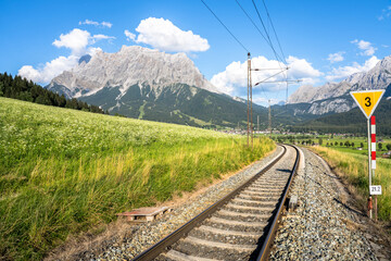 Obraz na płótnie Canvas Railway with Mountain Zugspitze in the background, Ehrwald, Germany