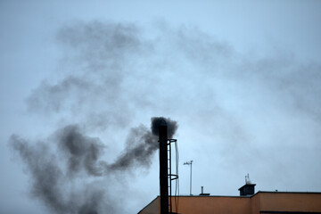 Smoke from a chimney that is harmful and very toxic to humans