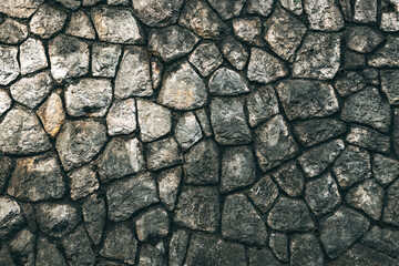 Old stone wall facade pattern as background
