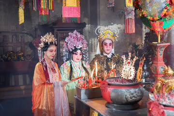 Fototapeta premium Chinese opera traditional dress in temple translation language is 'lucky and prosperity for all'