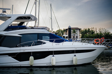 Fototapeta premium luxury yacht for travel against the backdrop of the sunset sky.