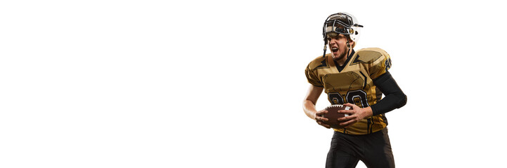 Champion. Man, american football player in uniform posing with ball over white studio background....