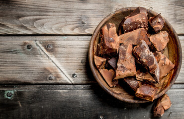 Pieces of chocolate in the bowl.