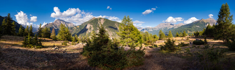 Fototapeta na wymiar Panoramic view of the La Coche Plateau in Ecrins National Park. The Champoleon Valley is to the left with the Drac Valley to the right. Hautes-Alpes, France