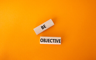 Be Objective symbol. Wooden blocks with words Be Objective. Beautiful orange background. Business and Be Objective concept. Copy space.