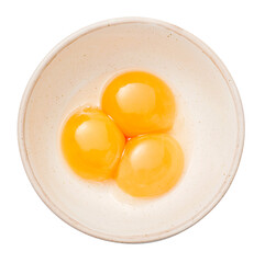 Bowl of egg yolks isolated. Top view of egg yolks.