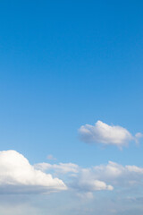 Spring blue sky with white clouds. Spring nature background