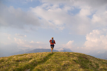 A man trail running in the French Alps near Chamonix