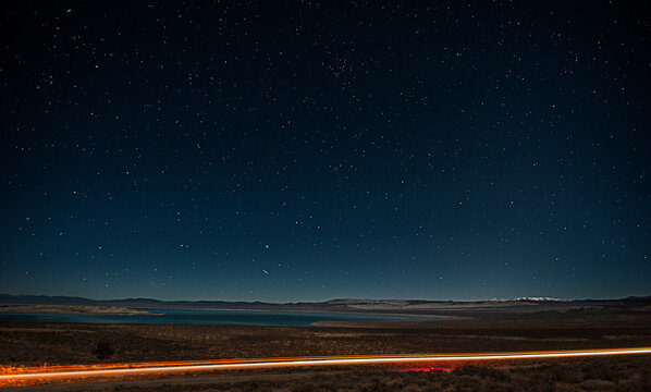 Night sky of stars over mono lake in California