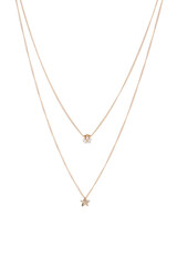 Close-up shot of a gold necklace with star pendants. The necklace consists of two different chains. The necklace is isolated on a white background. Front view.