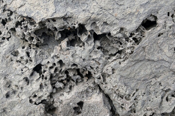Gray texture of the stone. The background of the mountain, the concrete.