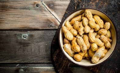 Peanuts in a bowl on the Board.