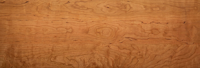 Wooden board desktop. Cherry wood wood board long desktop background. Wide solid wood desktop. The...