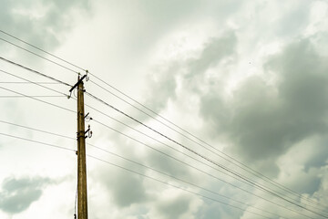 Power electric pole with line wire on colored background close up
